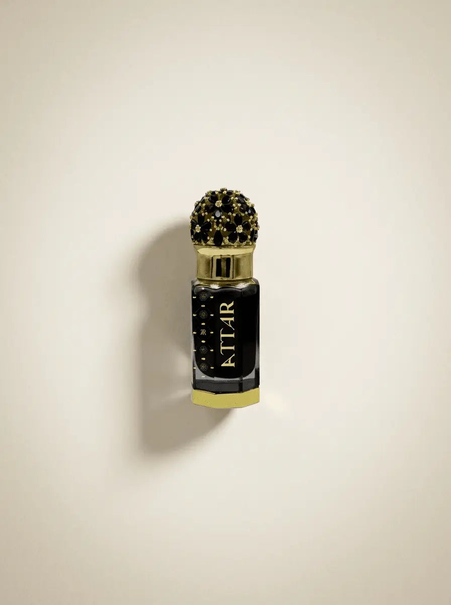 Malaysian King luxury attar bottle with ornate design and rich fragrance.