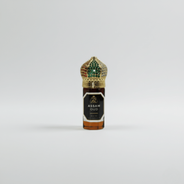 Assam Oud perfume bottle with decorative cap on a light gray background