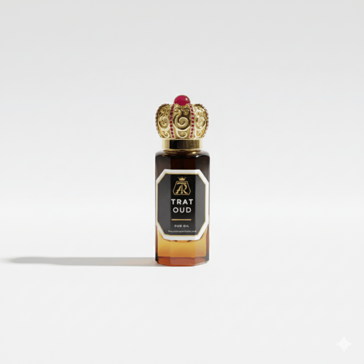 Bottle of TRAT OUD oil with a decorative cap on a white background