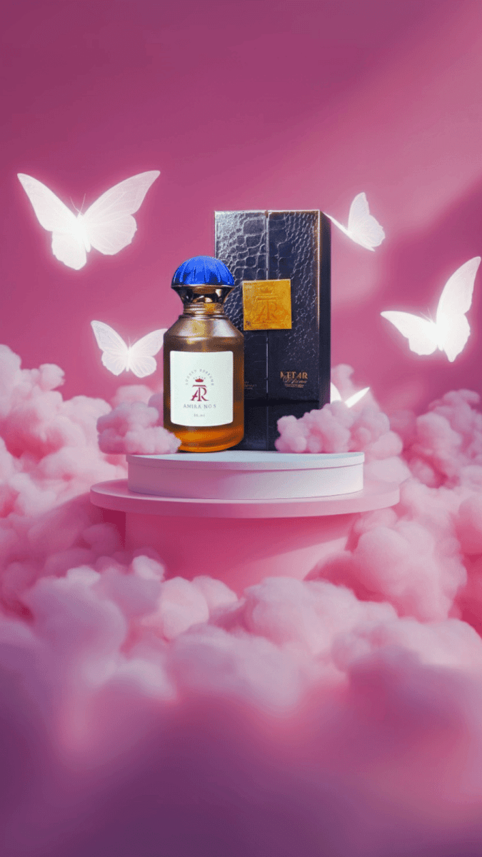 Bottle and box of a perfume on a pink cloud background with butterflies