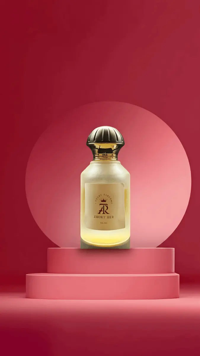 Zhory Her Eau de Parfum in a frosted glass bottle with a gold cap, displayed on a pink podium against a gradient background.