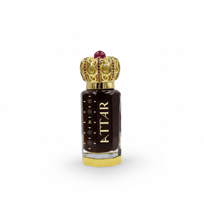Perfume bottle with ornate gold cap on a white background