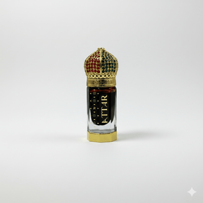 Decorative perfume bottle with a crown-like top on a white background