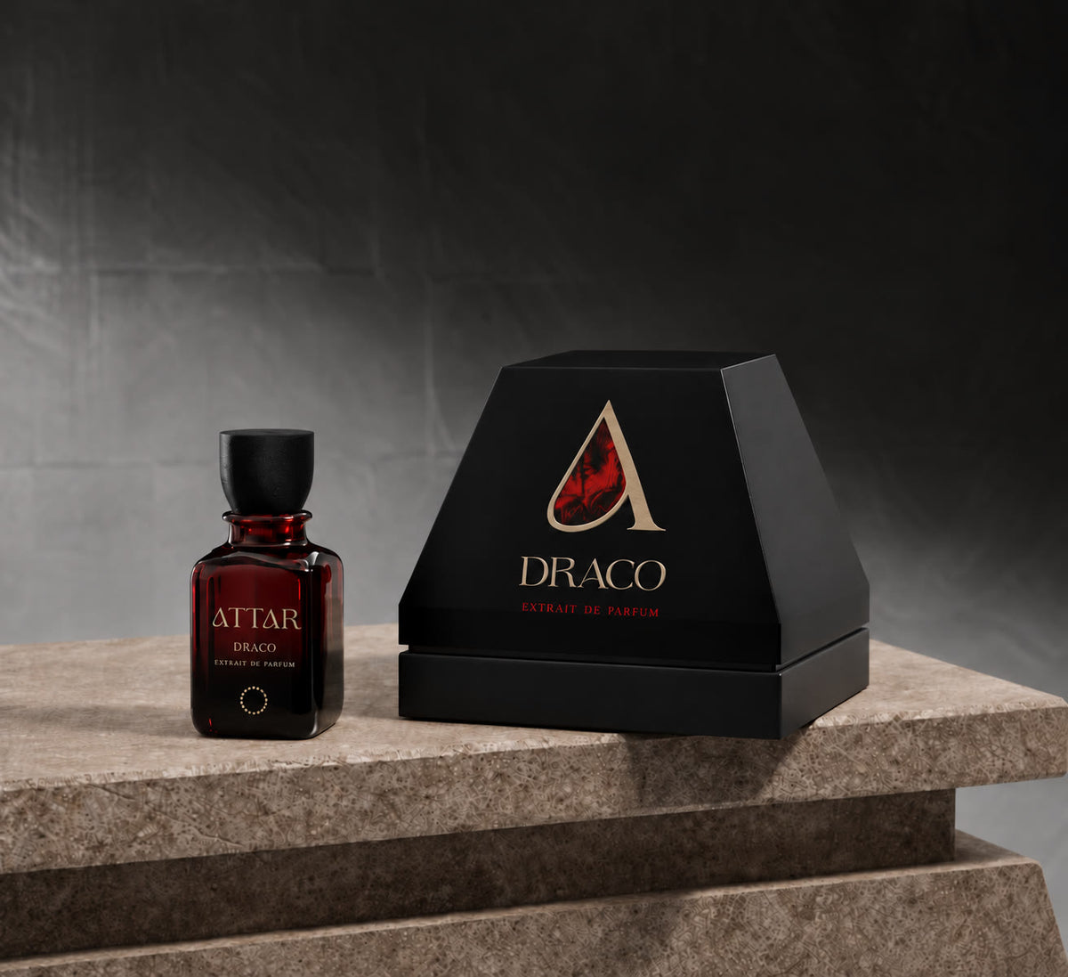 ATTAR Draco extrait de parfum bottle beside its black gift box
